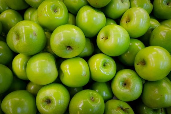 Apples produce ethylene gas which cause other fruit and vege to ripen faster