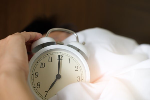 Hitting the snooze button repeatedly is apparently not good for your internal clock and makes you more sleepy