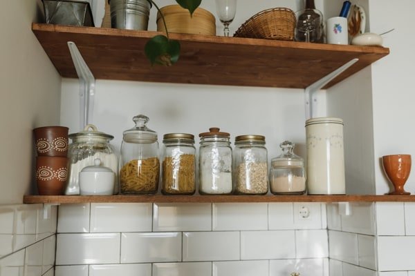 Open shelving can be messy or decorative