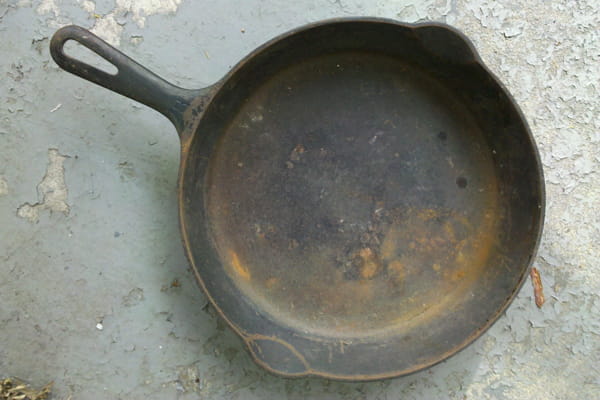 Rusty cast iron pan