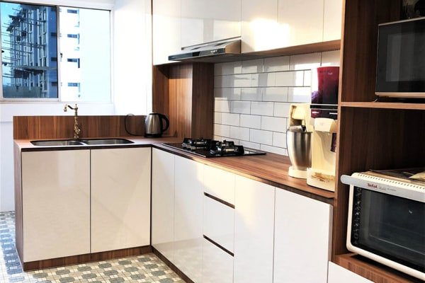 White Cabinets With Wood Trimming by White Artz Carpentry